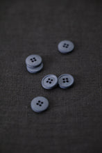 Load image into Gallery viewer, 4-Hole Cotton Buttons scattered on top of fabric
