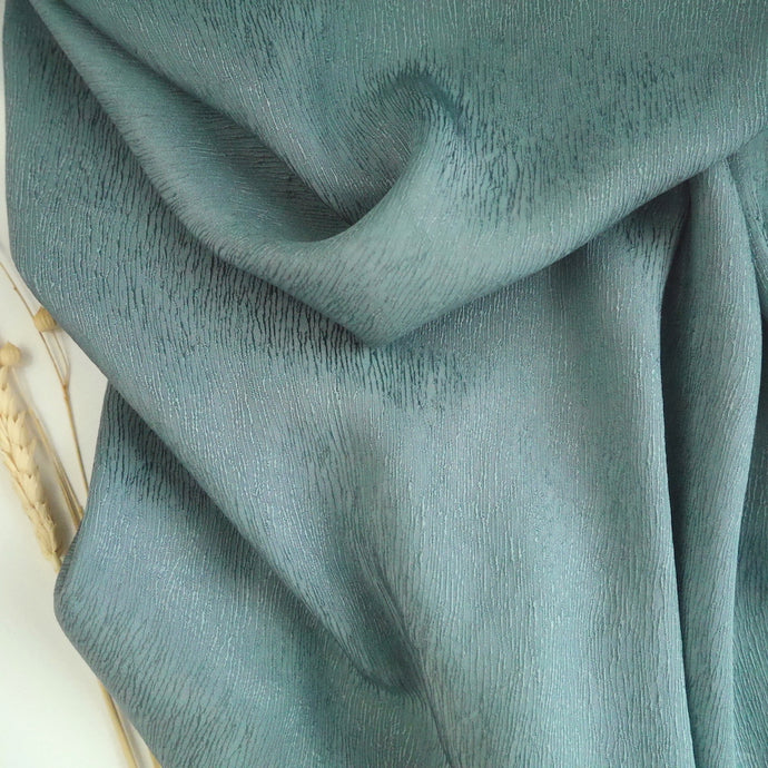Cupro fabric in gentle folds