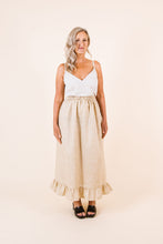 Load image into Gallery viewer, Lady wears an elasticated waist skirt, ankle length with frill hem
