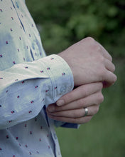 Load image into Gallery viewer, Close up of man fastening sleeve cuff button.
