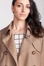 Load image into Gallery viewer, Close up of lapels of lady wearing the Isla tench coat slightly open.
