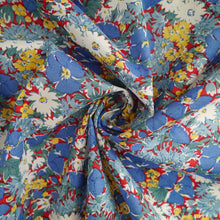 Load image into Gallery viewer, Jasmine Floral Cotton Lawn fabric with central swirl shows a soft handle

