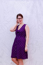 Load image into Gallery viewer, Lady wears sleeveless dress made with Coeur A Prendre Viscose print fabric
