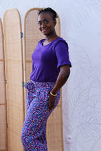 Load image into Gallery viewer, Lady wears trousers of GIverny Viscose Fabric print
