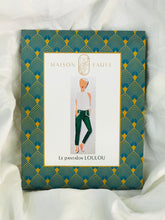 Load image into Gallery viewer, Loulou sewing pattern packaging showing illustration of lady wearing a pair of fitted trousers.
