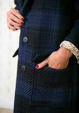 Load image into Gallery viewer, Close up of hand in pocket detailing on coat
