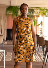 Load image into Gallery viewer, Lady wears a sleeveless Luz Dress in patterned fabric
