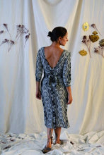 Load image into Gallery viewer, Back view of Sierra Dress showing deep V neck with wide waist belt tie
