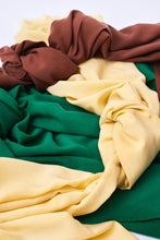 Load image into Gallery viewer, Vida Voile with TENCEL Lyocell fibres fabrics in three different colours entwined in each other
