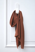 Load image into Gallery viewer, Vida Voile with TENCEL Lyocell fibres fabric hangs and drapes over a hook
