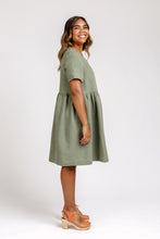 Load image into Gallery viewer, Side view of lady wearing tee dress with gathered skirt
