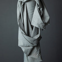 Load image into Gallery viewer, Top end of fabric roll stood up with Organic Cotton Voile fabric draped across itself

