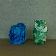 Load image into Gallery viewer, After the Rain fabrics in green and blue used as wrapped gifting objects
