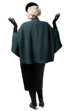 Load image into Gallery viewer, Back view of lady wearing cape, emphasising width and hip level length of cape.

