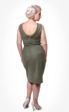 Load image into Gallery viewer, Back view of lady wearing green sleeveless dress with a lack back neckline, and pencil skirt.
