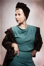 Load image into Gallery viewer, View of lady wearing top, accentuating cowl neck, with vertical pleats on shoulder seams, and under bust seam.
