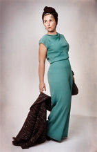 Load image into Gallery viewer, Side view of lady standing with back arched, shows wide leg trouser suit.
