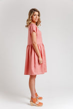 Load image into Gallery viewer, Side view of lady wearing short sleeve top and gathered waist, knee length dress
