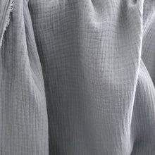 Load image into Gallery viewer, Organic Cotton Double Gauze fabrics hang, showing a soft drape
