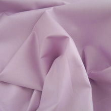 Load image into Gallery viewer, Close up of scrunched organic cotton fabric shows structure
