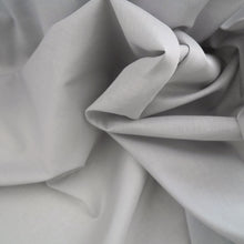 Load image into Gallery viewer, Close up of Organic Cotton Voile scrunched shows sheerness and structural drape
