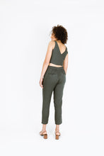 Load image into Gallery viewer, Back view of lady wearing Guise Pant Trousers with elasticated waistband and welt pockets.
