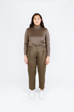 Load image into Gallery viewer, Lady wears trousers, Guise Pants, with inverted pleats at waistband 
