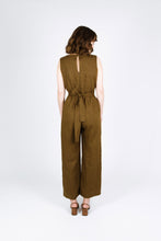 Load image into Gallery viewer, Back view of lady wearing Mirri Jumpsuit shows waist ties tied at centre back with back centre front opening with button and loop closure
