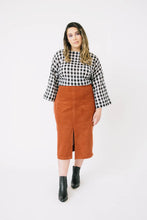 Load image into Gallery viewer, Lady wears Nexus Blouse in gingham fabric with wide sleeves
