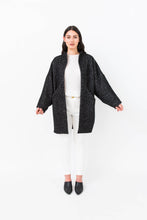 Load image into Gallery viewer, Lady wears Nova coat in a wool fabric
