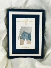 Load image into Gallery viewer, Packaging of Pippa sewing pattern, shows illustration of Pippa shorts with curved overlapping seams.

