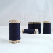 Load image into Gallery viewer, Five wooden reels of organic cotton sewing thread in a dark navy midnight blue.
