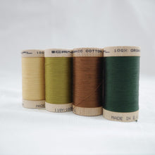 Load image into Gallery viewer, Four wooden reels of Scanfil Organic Cotton Thread in Straw, Celery, Acorn Brown and Forest Green colours.

