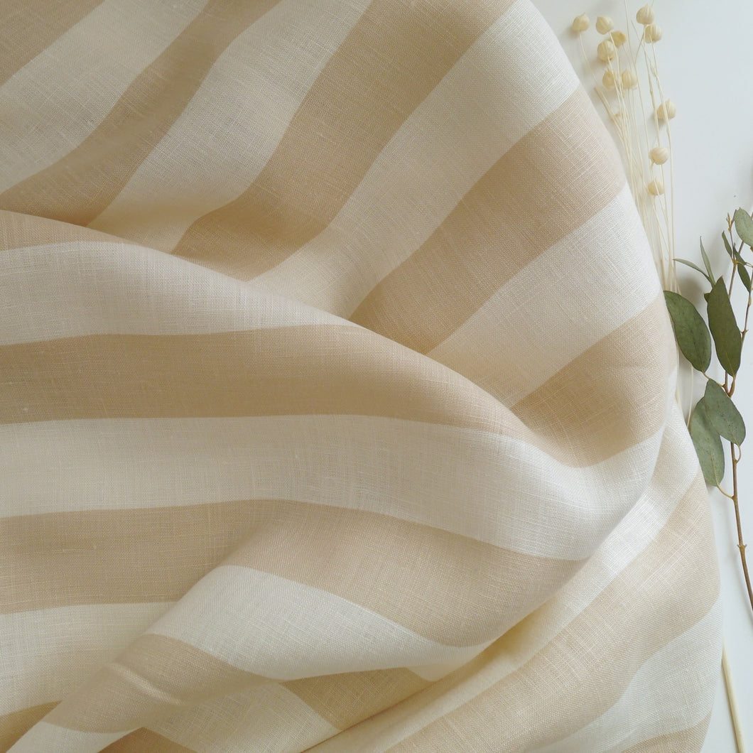 Fabric slightly scrunched up shows drape of Stripe Linen