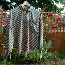 Load image into Gallery viewer, Shirt hanging on washing line, made with Grassland Viscose fabric

