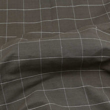 Load image into Gallery viewer, Cotton Khadi fabric with box check pattern lay over a lump to show drape

